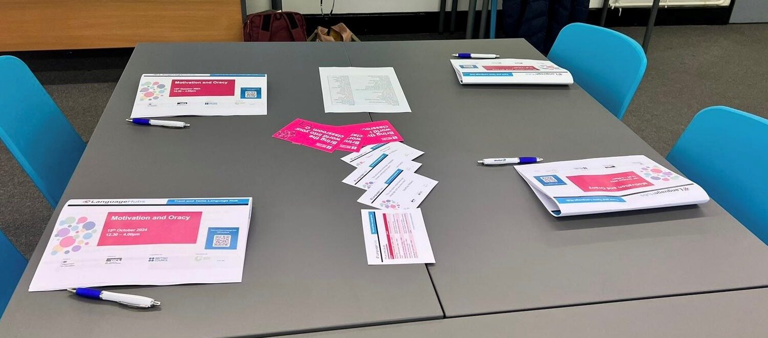 A picture of a table with CPD booklets, pens and flyers.